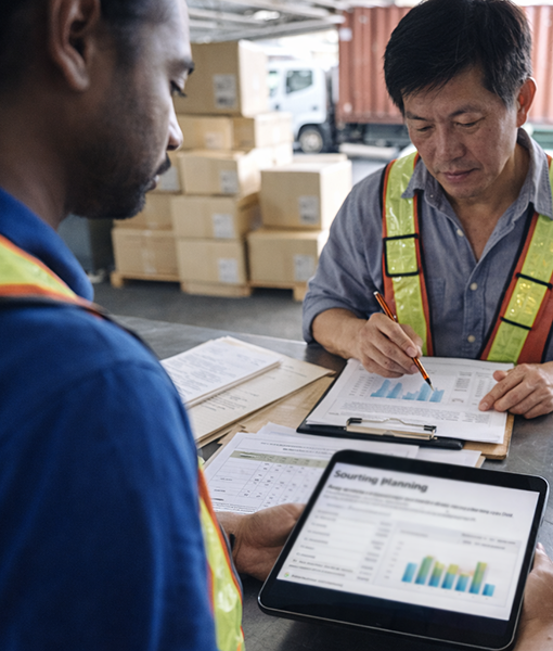 Team reviewing demand forecast and supply planning data